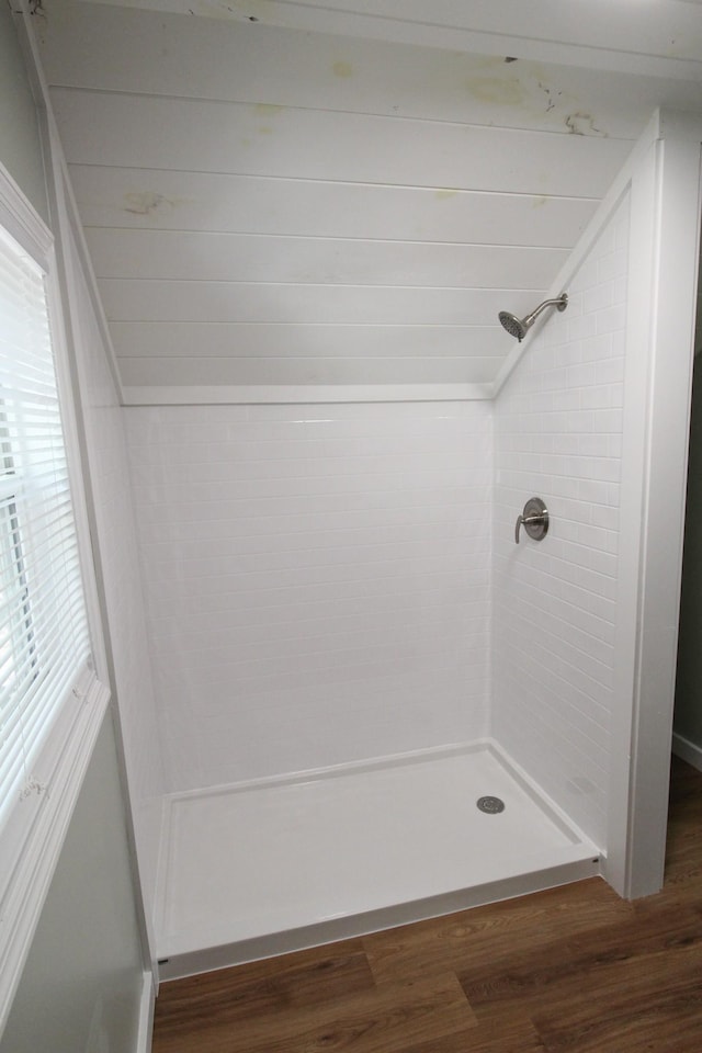 61 Kentucky Dr, Cadiz, KY 42211 - full bathroom featuring wood finished floors and a tile shower