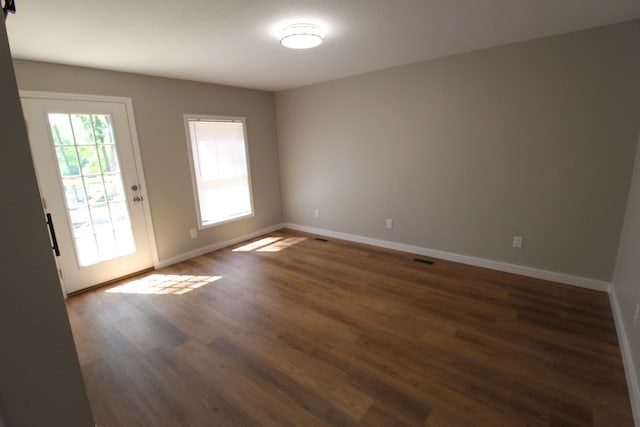 61 Kentucky Dr, Cadiz, KY 42211 - spare room featuring wood finished floors and baseboards