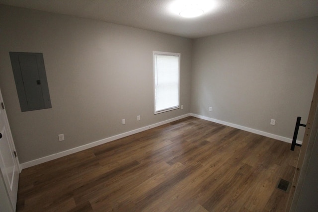 61 Kentucky Dr, Cadiz, KY 42211 - empty room featuring electric panel and dark wood-style floors