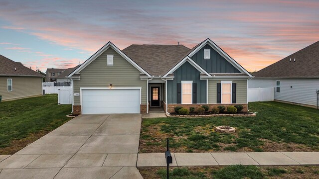 1331 Maize Ln, Lebanon, TN 37087 - view of front of home featuring board and batten siding, driveway, and brick siding