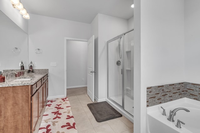1331 Maize Ln, Lebanon, TN 37087 - bathroom featuring double vanity, a shower stall, a garden tub, and tile patterned floors