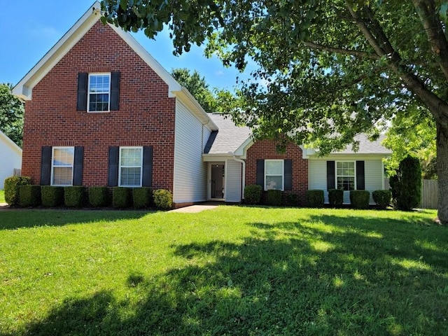 1918 Lawndale Dr, Spring Hill, TN 37174 - traditional home with a front yard and brick siding
