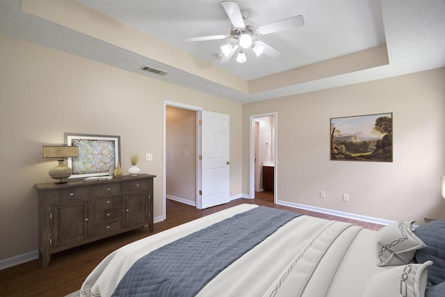 1918 Lawndale Dr, Spring Hill, TN 37174 - bedroom with a raised ceiling, dark wood-style floors, and ceiling fan