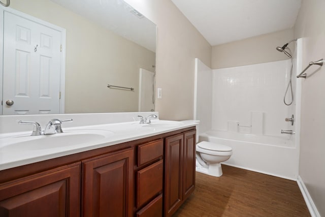 1918 Lawndale Dr, Spring Hill, TN 37174 - bathroom with double vanity, wood finished floors, and washtub / shower combination