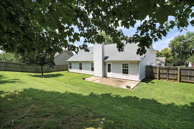 1918 Lawndale Dr, Spring Hill, TN 37174 - back of house with a patio, a chimney, a fenced backyard, and a shingled roof