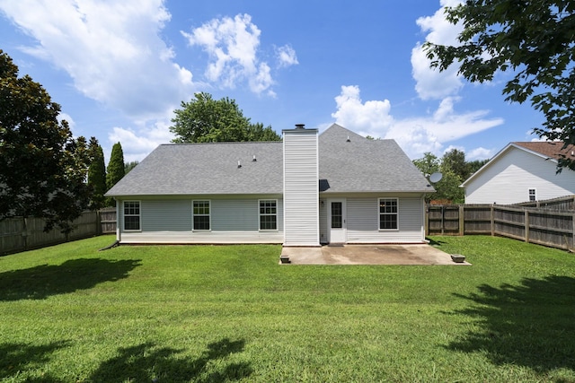 1918 Lawndale Dr, Spring Hill, TN 37174 - rear view of property with a patio, a fenced backyard, a chimney, and roof with shingles