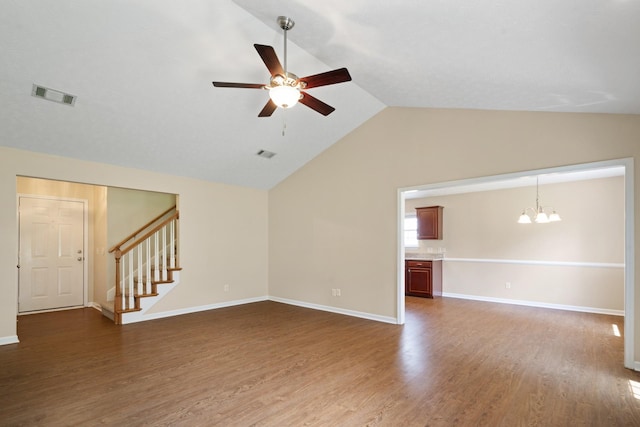 1918 Lawndale Dr, Spring Hill, TN 37174 - unfurnished living room with ceiling fan, a chandelier, stairway, lofted ceiling, and wood finished floors