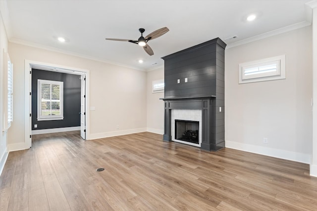 2620 Buckner Ln, Thompsons Station, TN 37179 - unfurnished living room with a ceiling fan, light wood finished floors, ornamental molding, a fireplace, and recessed lighting