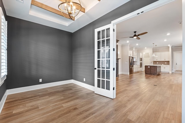 2620 Buckner Ln, Thompsons Station, TN 37179 - unfurnished room featuring light wood-style flooring, ceiling fan, a chandelier, recessed lighting, and ornamental molding