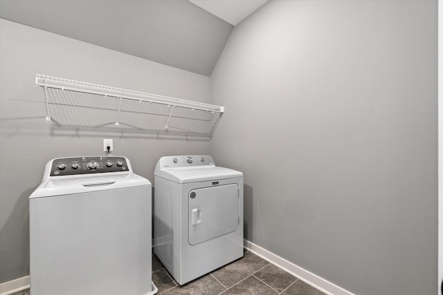 2620 Buckner Ln, Thompsons Station, TN 37179 - laundry area featuring washing machine and dryer and dark tile patterned flooring