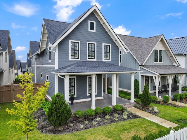 2620 Buckner Ln, Thompsons Station, TN 37179 - view of front facade featuring a shingled roof, a patio area, and board and batten siding