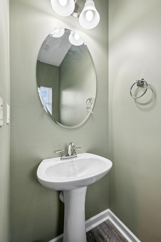 2305 Madeline Ct, Columbia, TN 38401 - bathroom featuring baseboards and wood finished floors