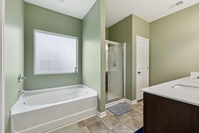 2305 Madeline Ct, Columbia, TN 38401 - bathroom featuring a bath, a stall shower, and double vanity