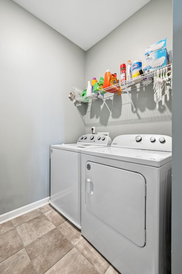 2305 Madeline Ct, Columbia, TN 38401 - laundry room with separate washer and dryer and baseboards