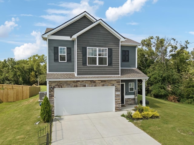 2305 Madeline Ct, Columbia, TN 38401 - craftsman-style home with stone siding, driveway, a garage, roof with shingles, and covered porch