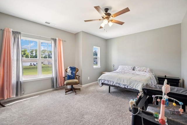2305 Madeline Ct, Columbia, TN 38401 - bedroom featuring multiple windows, carpet flooring, and a ceiling fan