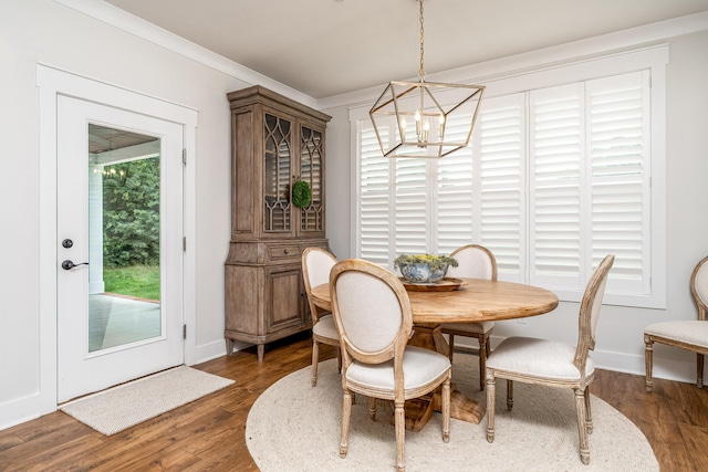 2744 Morrow Ln, Columbia, TN 38401 - dining area with a chandelier, wood finished floors, and crown molding