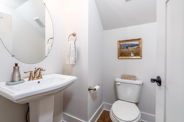 2744 Morrow Ln, Columbia, TN 38401 - bathroom with lofted ceiling and wood finished floors