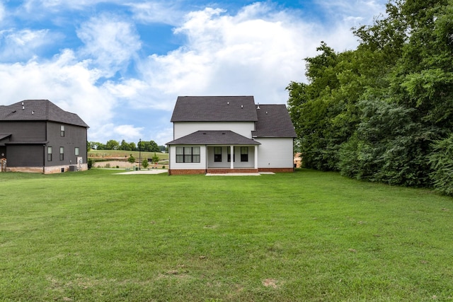 2744 Morrow Ln, Columbia, TN 38401 - rear view of house featuring a yard and a shingled roof
