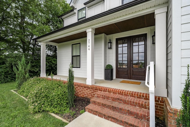 2744 Morrow Ln, Columbia, TN 38401 - doorway to property featuring covered porch, french doors, and board and batten siding