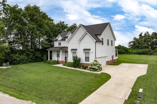 2744 Morrow Ln, Columbia, TN 38401 - modern farmhouse with board and batten siding, concrete driveway, a front yard, an attached garage, and roof with shingles