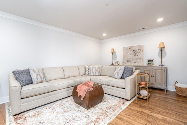 2744 Morrow Ln, Columbia, TN 38401 - living room with wood finished floors, crown molding, and recessed lighting