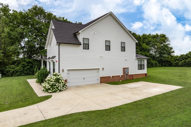 2744 Morrow Ln, Columbia, TN 38401 - view of property exterior featuring roof with shingles, a lawn, an attached garage, and concrete driveway