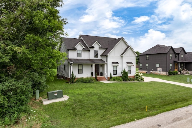 2744 Morrow Ln, Columbia, TN 38401 - modern farmhouse style home featuring board and batten siding and a front lawn