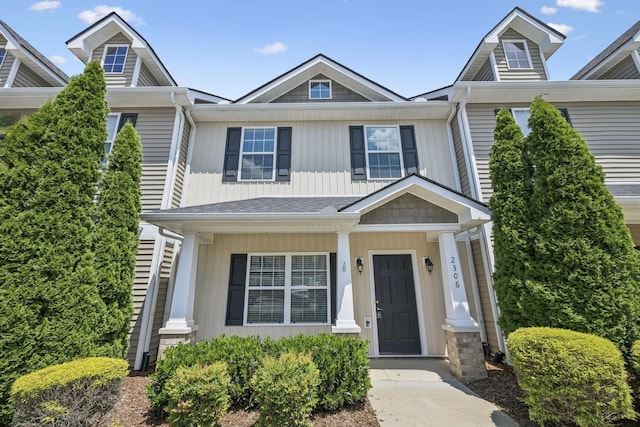 2306 New Holland Cir, Murfreesboro, TN 37128 - view of front of house featuring board and batten siding and covered porch