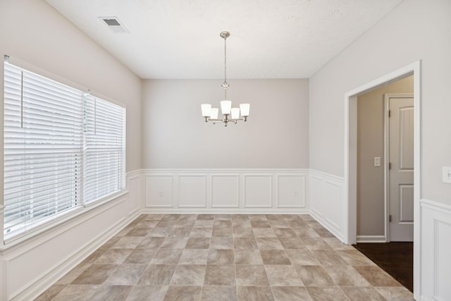2306 New Holland Cir, Murfreesboro, TN 37128 - unfurnished room with a chandelier and wainscoting
