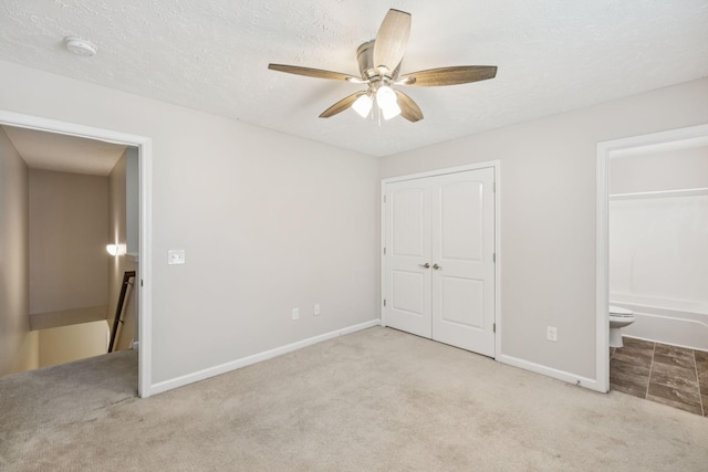 2306 New Holland Cir, Murfreesboro, TN 37128 - unfurnished bedroom with carpet floors, a closet, connected bathroom, and ceiling fan