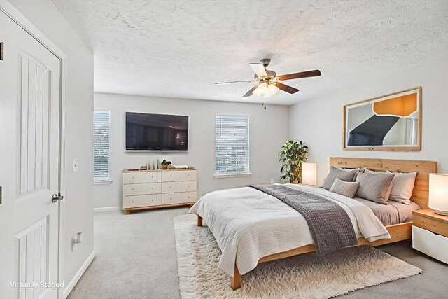 2306 New Holland Cir, Murfreesboro, TN 37128 - carpeted bedroom with ceiling fan and a textured ceiling