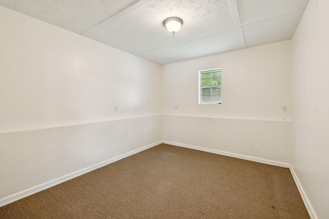 3337 Hartsville Rd, Lafayette, TN 37083 - carpeted spare room featuring baseboards and a textured ceiling