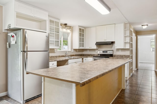 3337 Hartsville Rd, Lafayette, TN 37083 - kitchen featuring freestanding refrigerator, stainless steel range with electric cooktop, under cabinet range hood, open shelves, and tile patterned floors