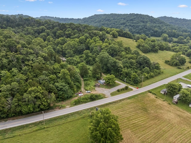 3337 Hartsville Rd, Lafayette, TN 37083 - drone / aerial view of a mountainous background and a heavily wooded area