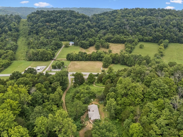 3337 Hartsville Rd, Lafayette, TN 37083 - aerial view of property and surrounding area featuring a forest