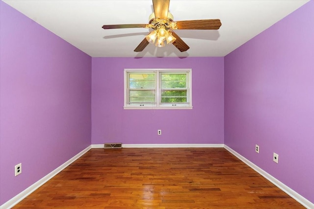 318 David St, Lawrenceburg, TN 38464 - spare room featuring wood finished floors and a ceiling fan