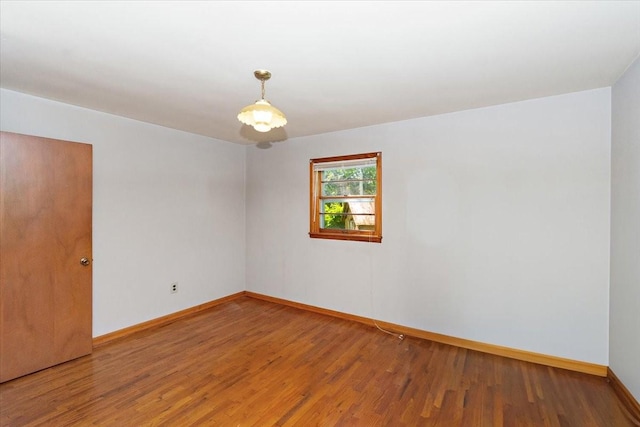 318 David St, Lawrenceburg, TN 38464 - unfurnished room with baseboards and wood finished floors
