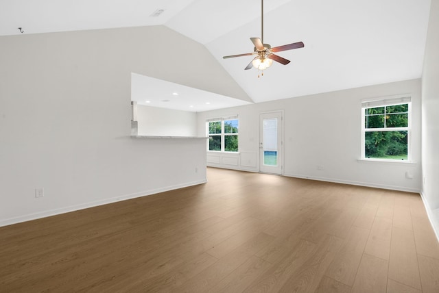 2149 Longhunter Chase Dr, Spring Hill, TN 37174 - unfurnished living room featuring ceiling fan, lofted ceiling, wood finished floors, and recessed lighting