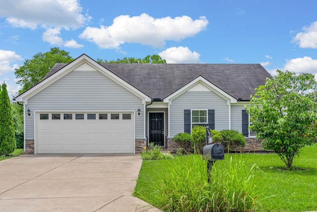 2149 Longhunter Chase Dr, Spring Hill, TN 37174 - single story home featuring stone siding, concrete driveway, a front lawn, a shingled roof, and a garage