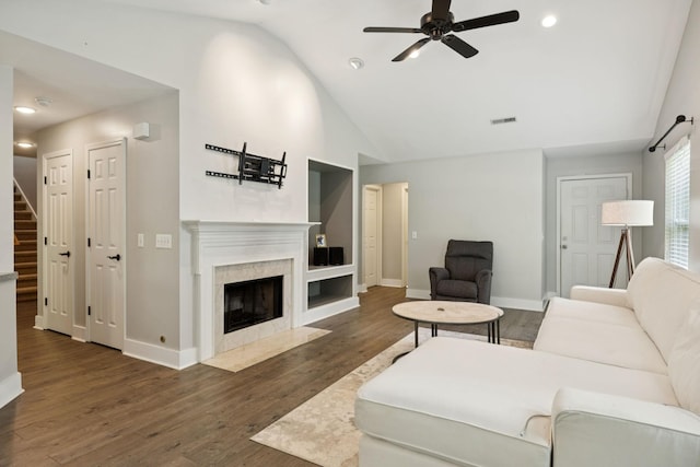 808 Garrett Way Ct, Antioch, TN 37013 - living area featuring a ceiling fan, stairway, a fireplace, dark wood finished floors, and high vaulted ceiling