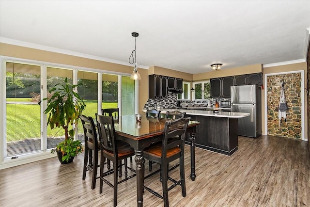 19 Horseshoe Bend Rd, Leoma, TN 38468 - dining area featuring wood finished floors and crown molding