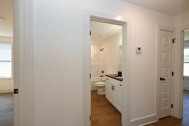 1142 Snow Ave, Madison, TN 37115 - bathroom with vanity, wood finished floors, bathing tub / shower combination, and healthy amount of natural light