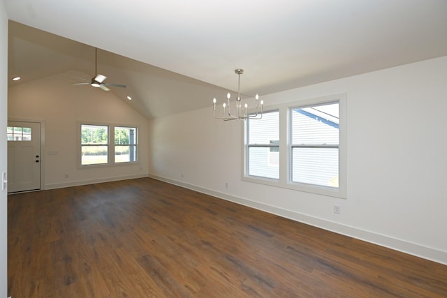 1142 Snow Ave, Madison, TN 37115 - empty room with a chandelier, dark wood-style floors, vaulted ceiling, and a ceiling fan