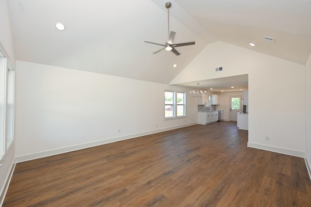 1142 Snow Ave, Madison, TN 37115 - unfurnished living room with a chandelier, a ceiling fan, high vaulted ceiling, dark wood-type flooring, and recessed lighting