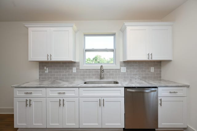 1142 Snow Ave, Madison, TN 37115 - kitchen featuring stainless steel dishwasher, tasteful backsplash, white cabinets, and light stone counters