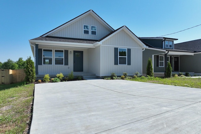 1142 Snow Ave, Madison, TN 37115 - view of front facade featuring covered porch and roof with shingles