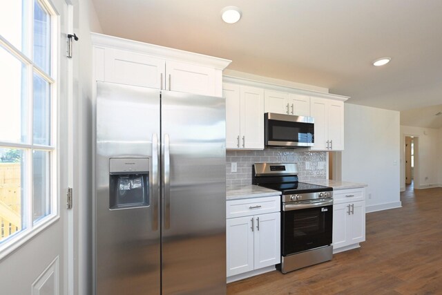 1142 Snow Ave, Madison, TN 37115 - kitchen featuring stainless steel appliances, tasteful backsplash, white cabinets, dark wood finished floors, and recessed lighting