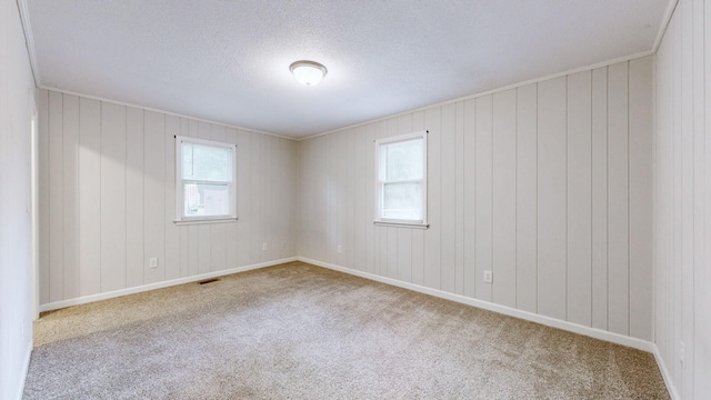 4321 Lynchburg Rd, Winchester, TN 37398 - carpeted spare room featuring plenty of natural light and a textured ceiling