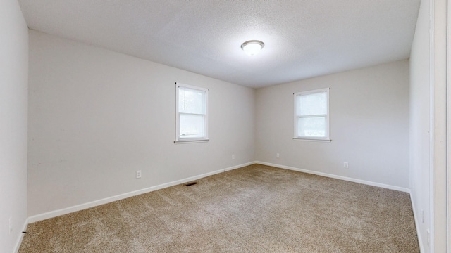 4321 Lynchburg Rd, Winchester, TN 37398 - spare room with carpet floors and a textured ceiling